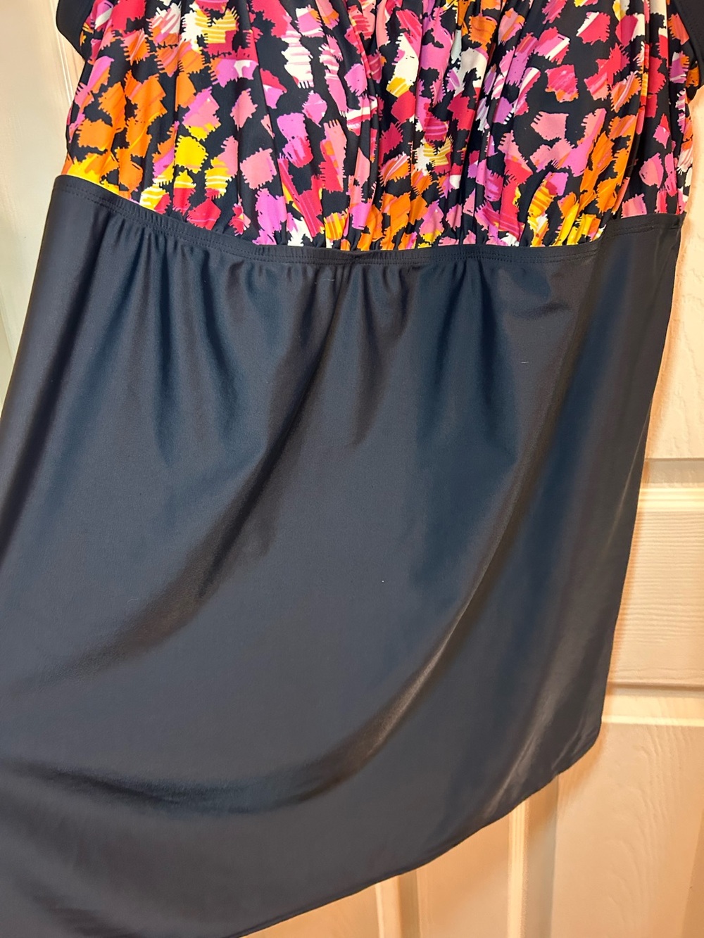 Black one piece underneath with dress. Pink & Orange Patterned Bust - Picture 3 of 7